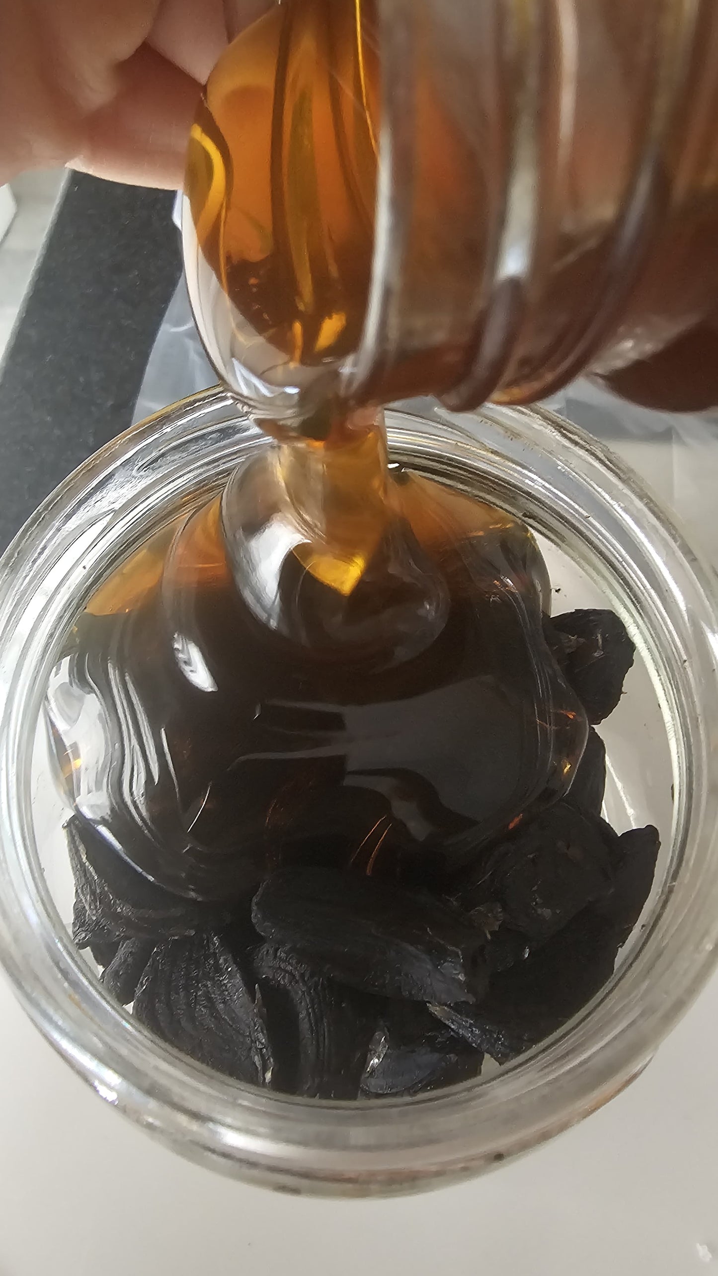 Black garlic fermented with honey by Dates and Roots