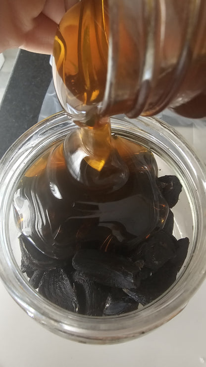 Black garlic fermented with honey by Dates and Roots